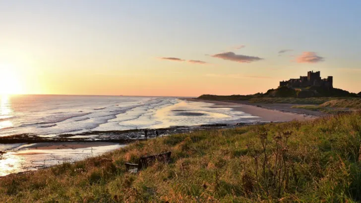 6 of the Best Northumberland Castles to Visit featured by top international travel blogger, Tracy's Travels in Time: image of Bamburgh Castle