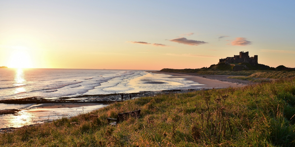 6 of the Best Northumberland Castles to Visit featured by top international travel blogger, Tracy's Travels in Time: image of Bamburgh Castle