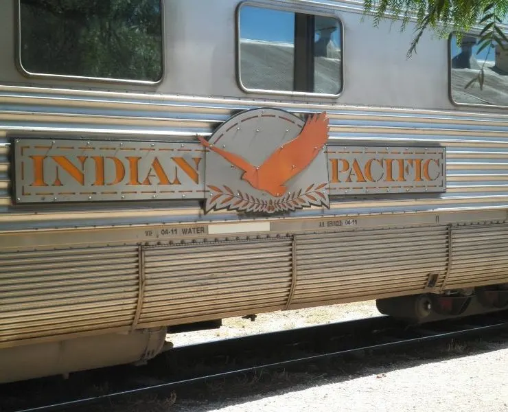 A picture of the logo on the side of the indian pacific train