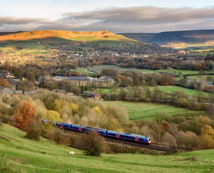 Train traveling across the English countryside 
