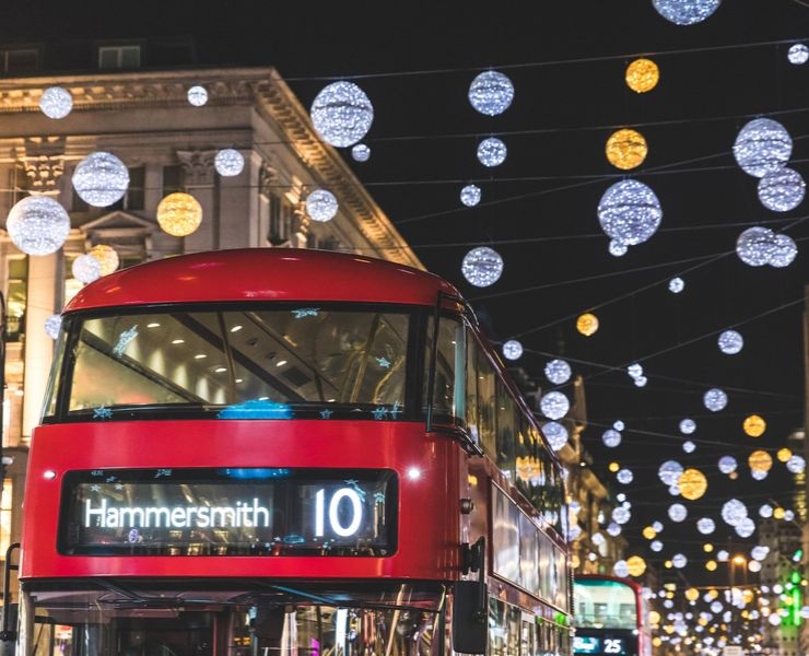 London bus with Christmas decorations in the background.