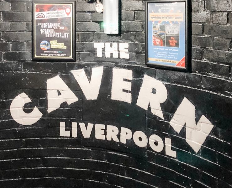 The words 'The Cavern Club' written on a wall