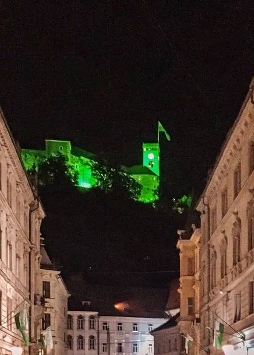 Ljubljana Castle is lit up at night and can't be missed when visiting Ljubljana