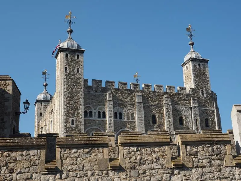 The White Castle at the Tower of London behind a stone wall 