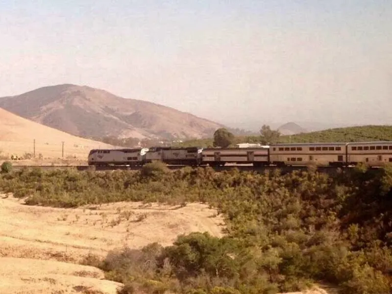 Amtrak Coast Starlight train travels through a very dry California.