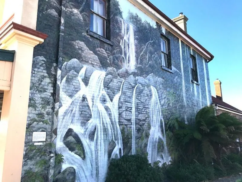 Street art in Tasmania of a waterfall