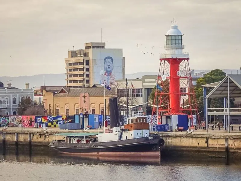 Murals and a boat in the Port of Adelaide
