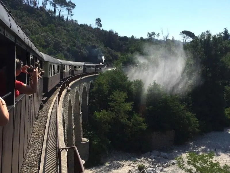 View from a steam train crossing  bridge in France