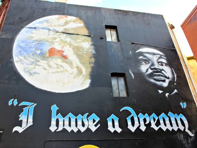 the words I had a dream with a picture of Martin Luther King painted on a wall in Sydney Australia