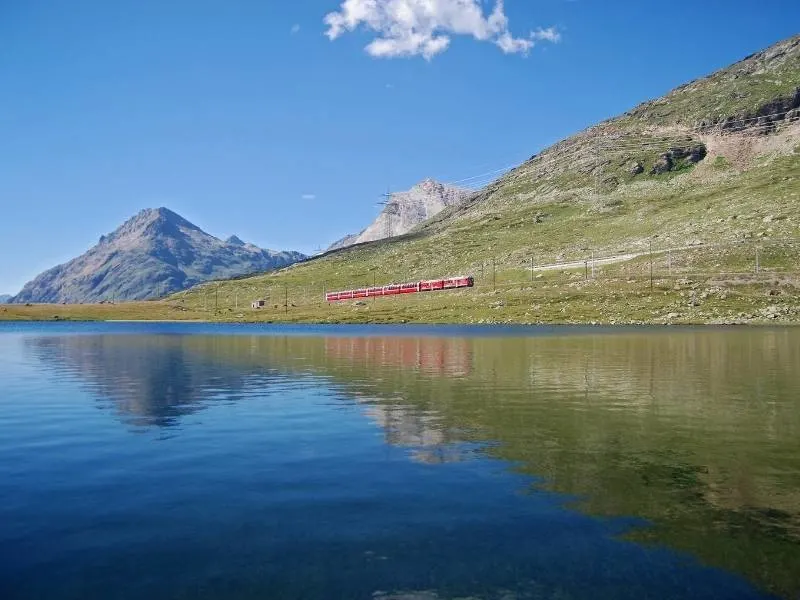 Bernina Express by the side of a lake