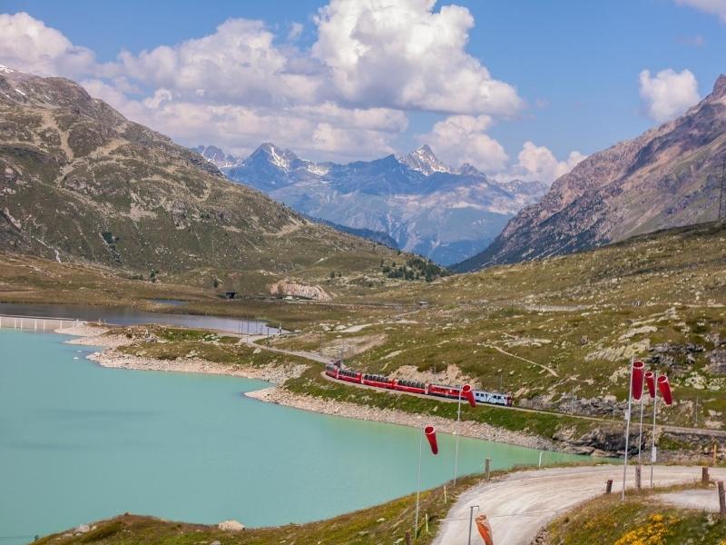 The Bernina Express crosses by Lake Bianco