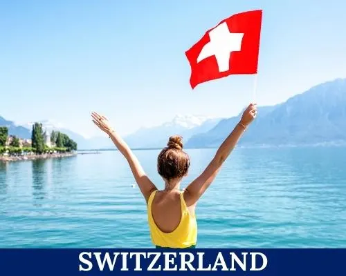 Lady waving a Switzerland flag