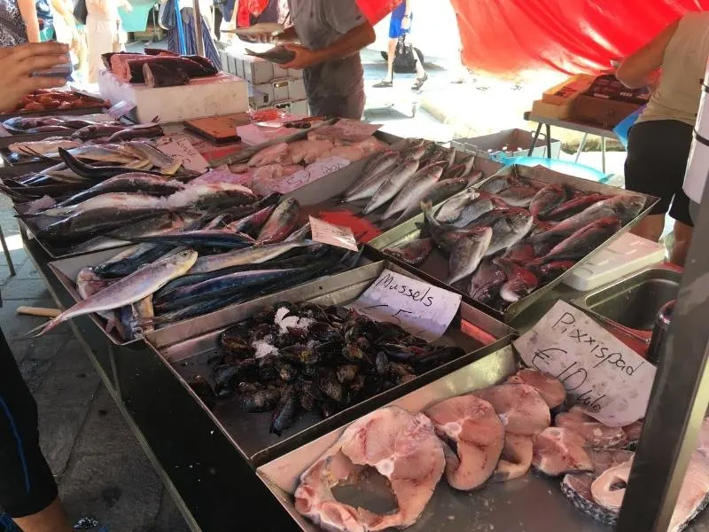 malta travel tips - visit the markets to see Fish on sale such as this stall in Marsaxlokk market in Malta.