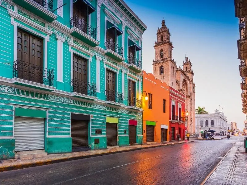 colourful houses in a street in Merida Mexico.