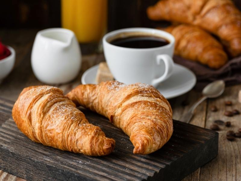 croissants and a cup of coffee.
