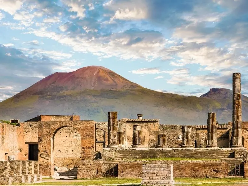 Pompeii with Vesuvius in the background.