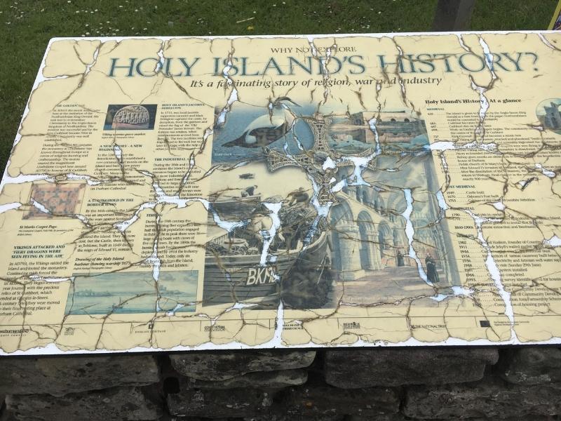 Signs in the car park on Holy Island about the history