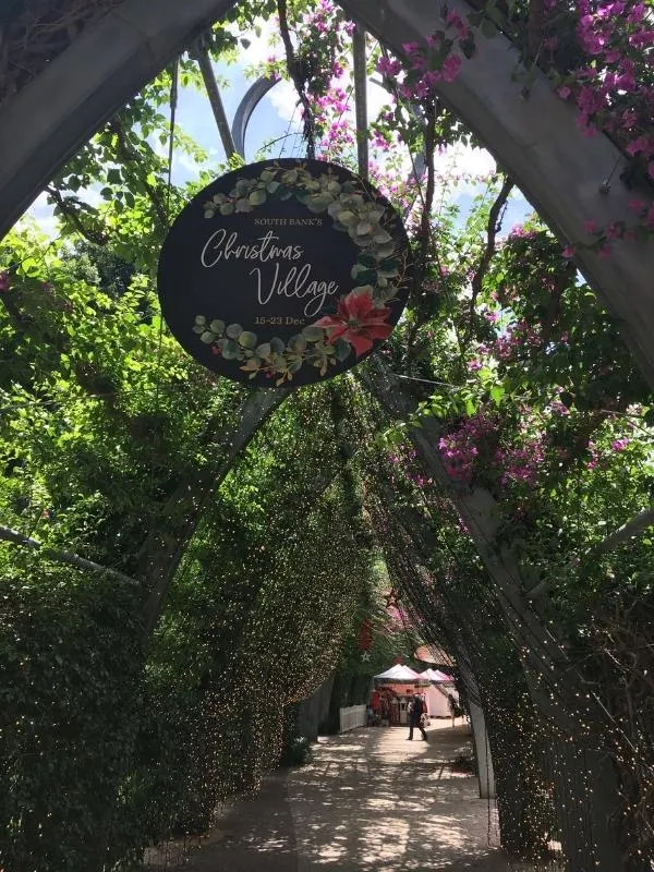 Christmas Village sign on the arbours at South Bank Brisbane.