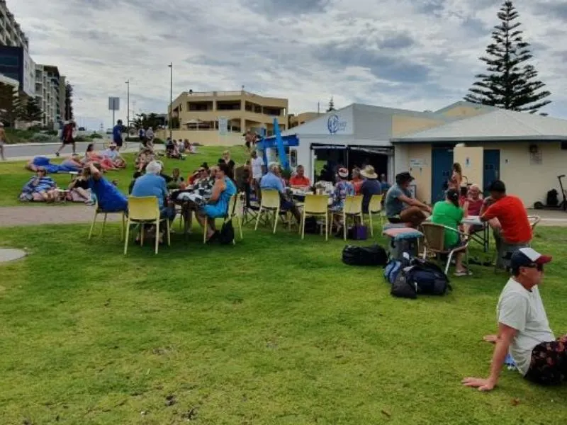 CBreeze at Scarborough Beach on Christmas morning with people enjoying a drink and bite to eat.