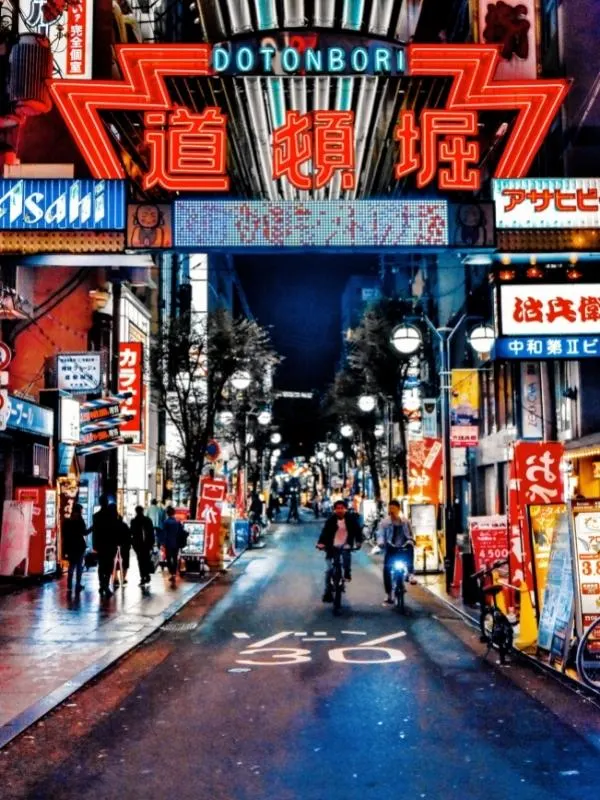 Tokyo street with neon signs.