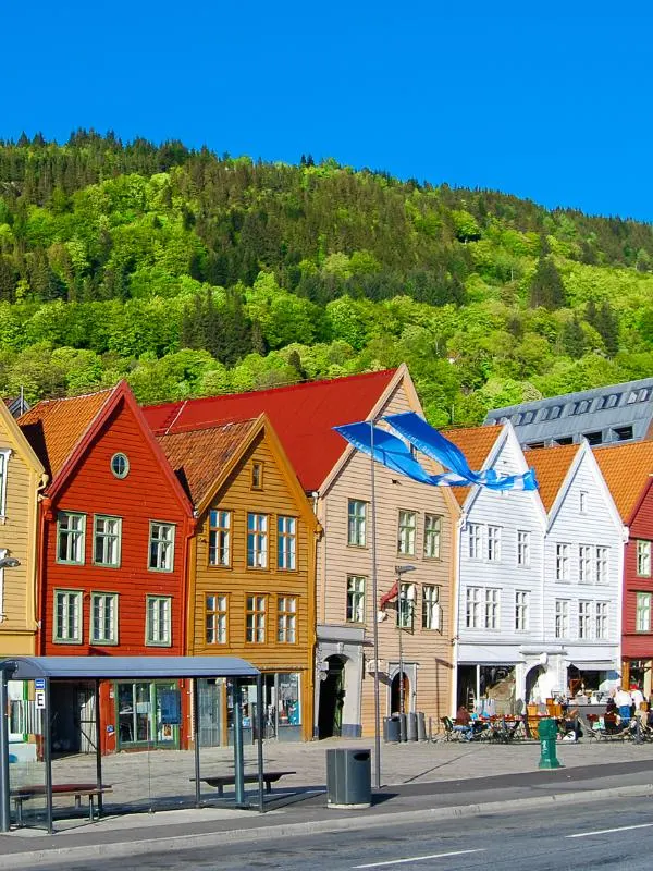 Brightly coloured shops in Bryggen Norway one of the best places to stay in Bergen.