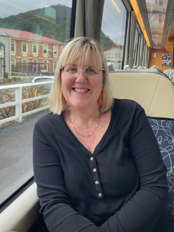 A lady on the TranzAlpine Express New Zealand.