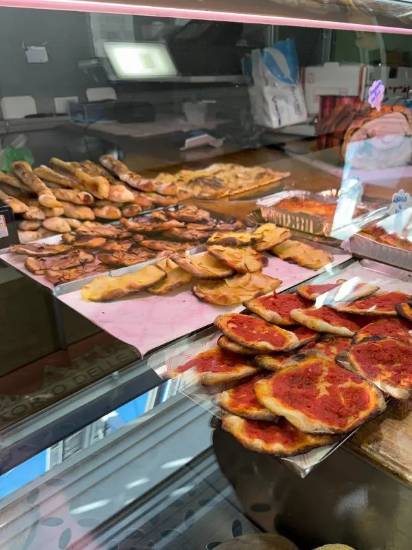 Pizza for sale in a market.