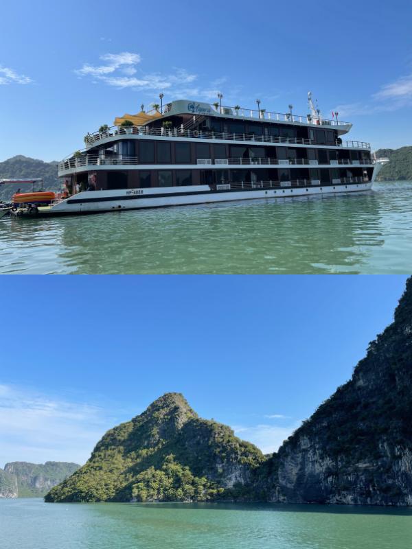 A boat and green hills in the sea.